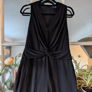 Black jumpsuit with sheer overlay